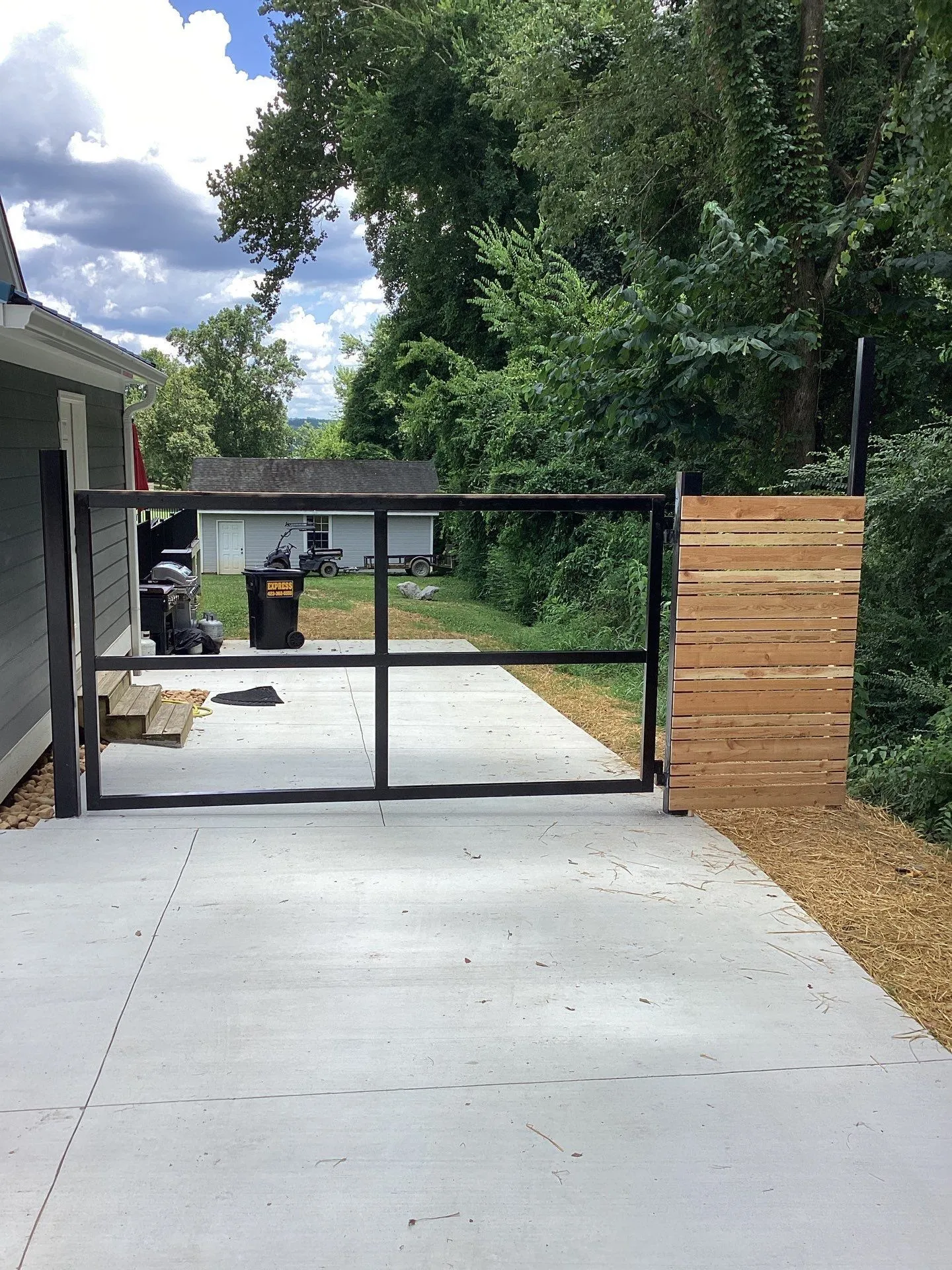 Steel & Wood Driveway Gate by River City Fence, Chattanooga TN